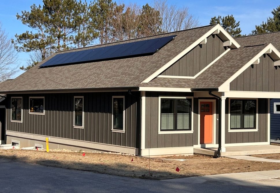 Empire House exterior with rooftop solar array