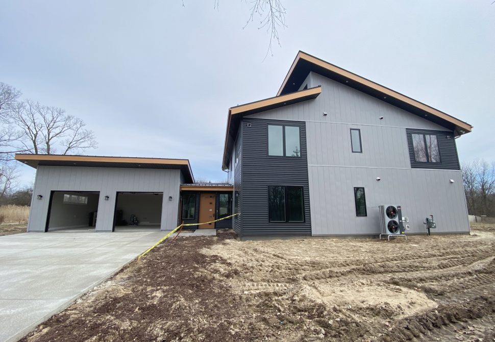 Vastu Shastra Sanctum modern two-story exterior with heat pump